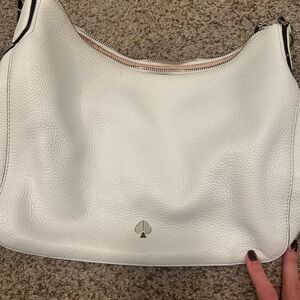 White leather Kate Spade handbag.